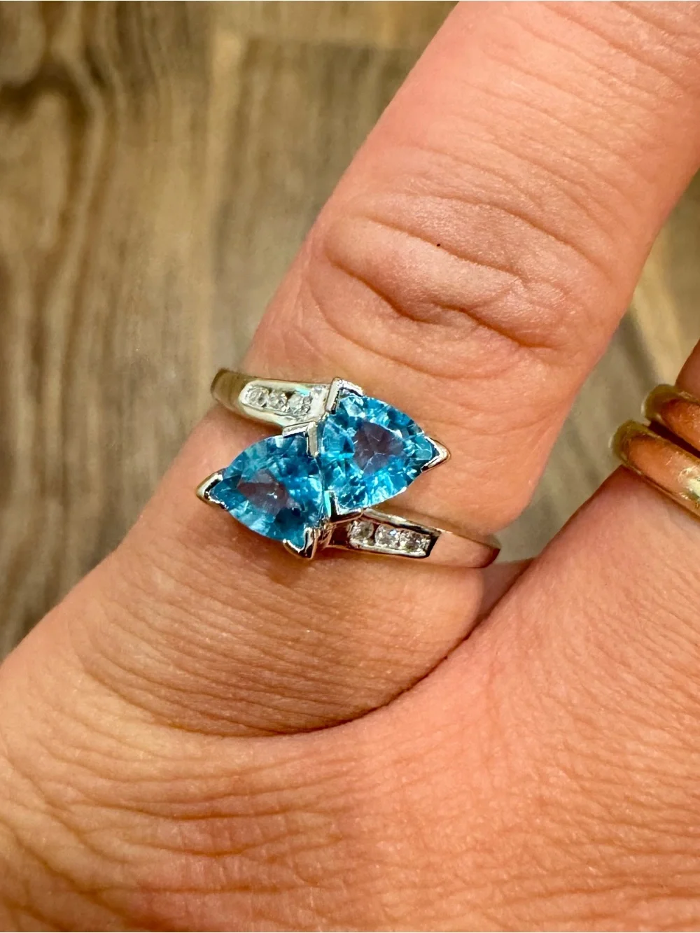 10K White Gold Blue Topaz and Diamond Bypass Ring